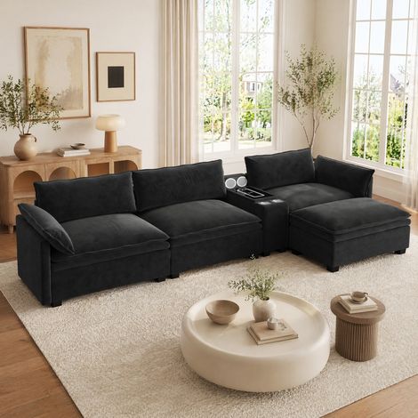 Divano modulare angolare in ciniglia nera 315 cm con pouf, ricarica wireless, altoparlante e luce (1/5)