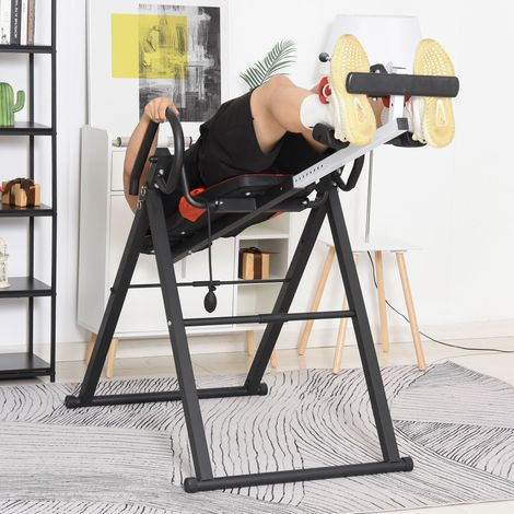 Banc d'inversion avec angle et hauteur réglables et appui-tête. En acier et plastique. 79 x 114 x 153 cm. Rouge et noir. (1/5)