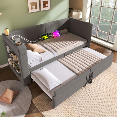 Cama sofá tapizada 90x200 cm gris con cama nido, puertos USB y portavasos (1/5)