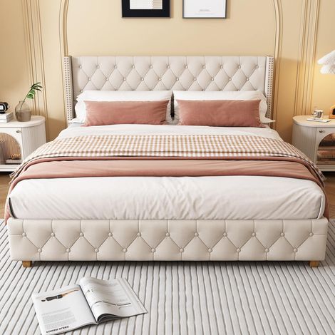 Lit double 160 x 200 cm en lin beige avec tête de lit capitonnée à boutons, rivets décoratifs et pieds en bois, sans matelas (1/5)