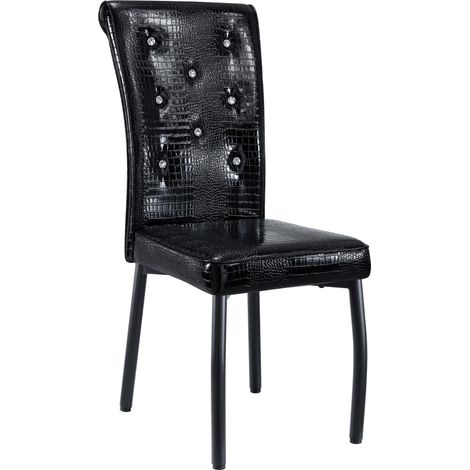Set da pranzo moderno con tavolo rotondo effetto marmo bianco e 4 sedie nere in ecopelle con dettagli a bottoni e gambe in metallo (1/5)