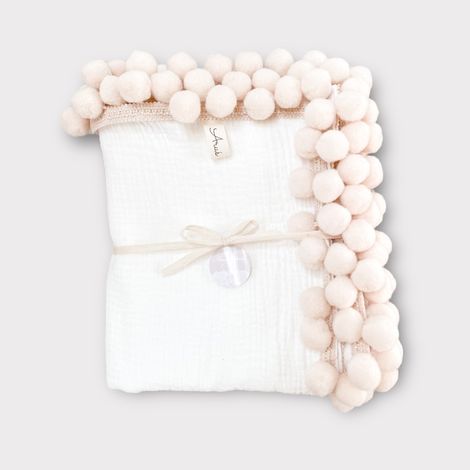 Coperta in mussola 100x75 cm, color crema con pompon beige. (1/5)