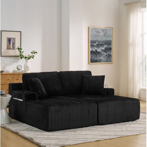 Canapé convertible 2 places noir en mousse et tissu corduroy avec poche latérale, porte-gobelet et coussins (1/5)