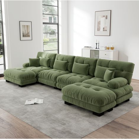 Divano modulare angolare verde in chenille con pouf mobile e design cloud (1/5)