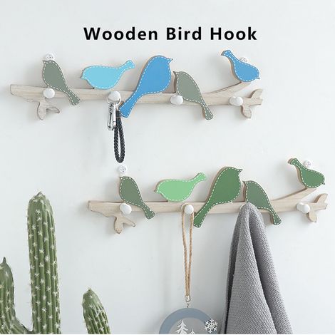 Kreative und minimalistische Wanddekoration aus Holz mit vogelförmigen Haken (1/5)