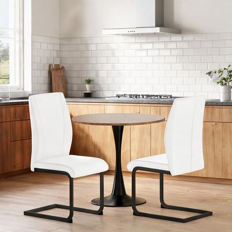 Set de 2 chaises de salle à manger blanches et noires en simili (1/5)