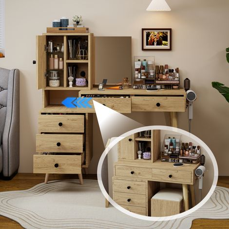 Coiffeuse moderne avec miroir et rangements le miroir est escamotable. Elle est équipée de 5 tiroirs, d’un meuble latéral et d’un tabouret rembourré beige (aspect bois naturel). (1/5)
