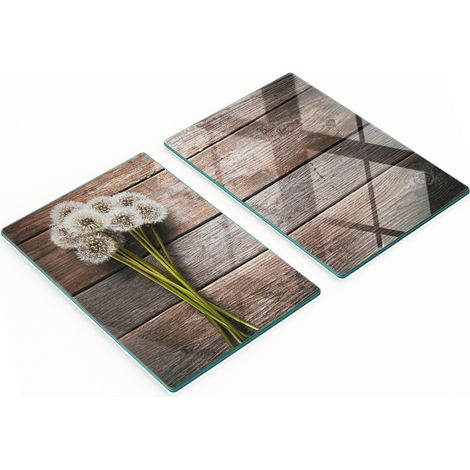 Tableros de vidrio templado con un estampado decorativo de dientes de le贸n sobre tableros de 2x40x52 cm.