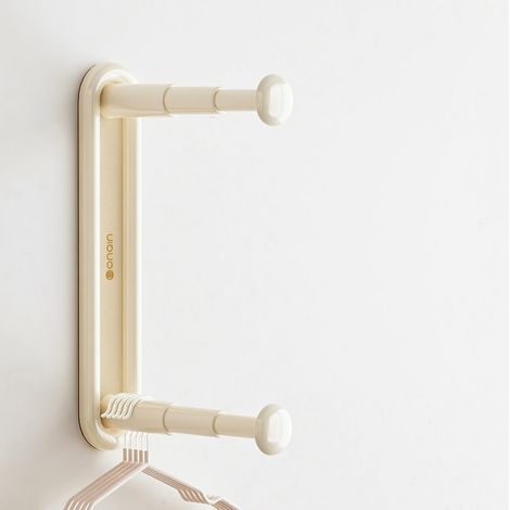 Cintres rétractables à fixer au mur