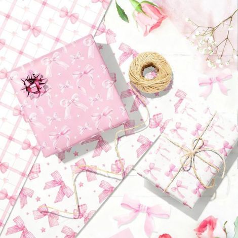 Papier cadeau rose à motifs de nœuds, parfait pour anniversaires, fêtes prénatales et activités de loisirs créatifs (1/5)