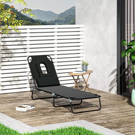 Chaise longue pliante avec ouverture pour le visage et coussins. Fabriquée en acier et en tissu Oxford.