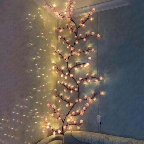 Cherry blossom shaped LED light branch with 72 LEDs, remote control and 8 lighting modes, ideal for home use.