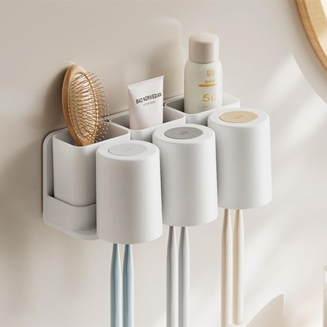 Soporte adhesivo con 3 vasos, 3 cajas desmontables y 6 compartimentos para cabezales de cepillo y pasta de dientes. (1/5)
