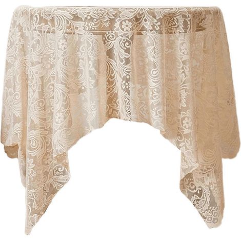 Nappe beige à motifs ajourés délicats, en polyester infroissable, idéale pour les repas décontractés ou formels. (1/5)