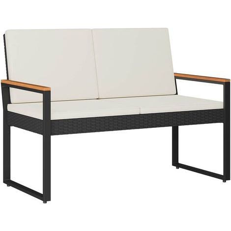 Le banc d'extérieur noir et blanc mesure 107 x 61 x 80 cm et est fabriqué en rotin. (1/5)
