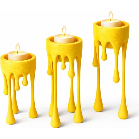 Un moderno candeliere a forma di "cera fluida" di colore giallo. (1/3)