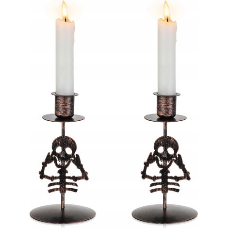 Ensemble de 2 bougeoirs décoratifs en métal noir en forme de crâne, parfaits pour Halloween. (1/5)