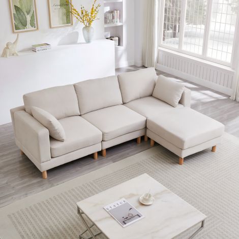 Canapé d'angle nordique 3 places avec pouf 235×152×78 cm – Canapé en L beige en polyester avec pieds en bois massif pour un salon moderne (1/5)