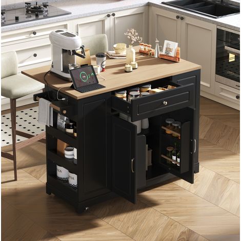Isla de cocina con ruedas y encimera extensible, 131,8 x 40–70 x 93,3 cm, negro/natural HAVRYA (1/5)