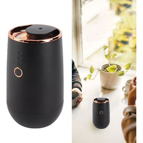 Difusor de aromas compacto y versátil para coche y hogar, con aceites esenciales y un moderno diseño en color negro (incluye 2 frascos de aceite). (1/5)