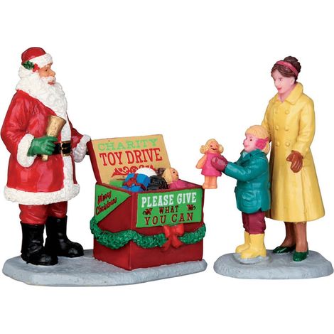 Statuetta di Babbo Natale e i regali decorazione per presepe o villaggio natalizio