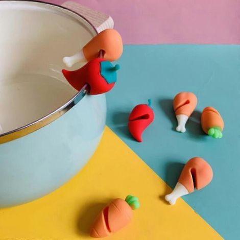 Support anti-débordement pour couvercles de casseroles, bouchons anti-débordement en silicone résistant à la chaleur, lève-couvercles, outils de cuisine créatifs et durables (1/2)