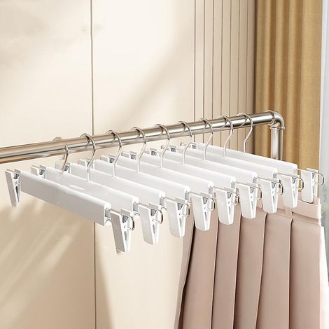 Lot de 10 cintres pour pantalons et jupes, modèles avec pinces antidérapantes et cintres plastiques robustes, rangement pratique pour vêtements dans dressing (1/5)
