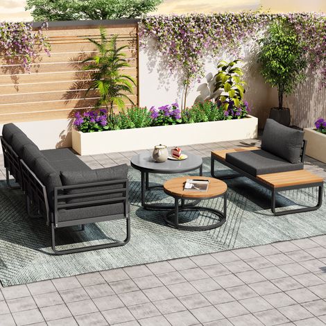 Ensemble mobilier de jardin 4-5 places avec deux tables basses empilables cadre fer galvanisé. Coussins gris complets et pieds ajustables.