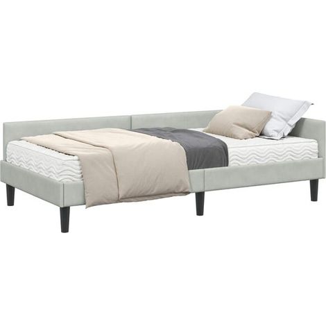 Cadre de lit d'angle avec matelas en deux parties, revĂŞtement en velours gris clair. (1/5)