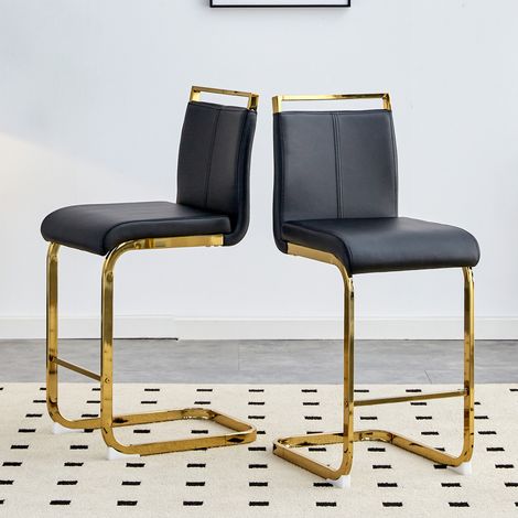 Lot de 2 tabourets hauts de bar design scandinave, recouverts de similicuir noir premium, avec piètement en métal doré, parfaits pour cuisines et restaurants.