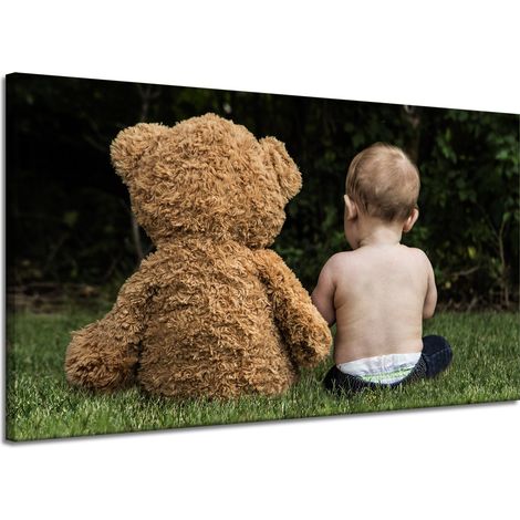 Impression sur toile Enfant avec un ours en peluche 120x70 cm