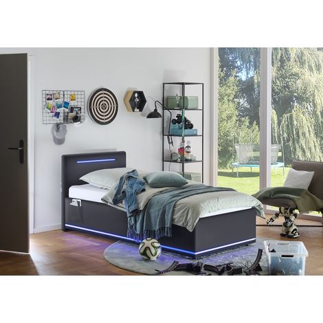 Meise Möbel Jugendbett Circle 90x200 cm  Bettgestell  LED & USB  4 Betttaschen  Kunstleder Schwarz  Holzfuß schwarz (1/5)