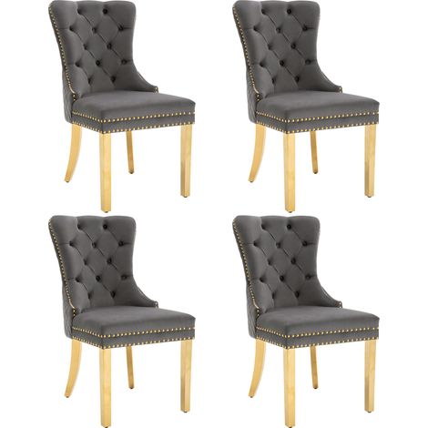 Silla de comedor tapizada en terciopelo gris con patas de acero inoxidable dorado (1/5)