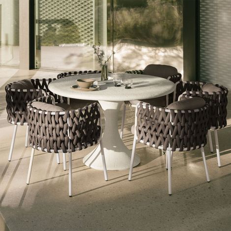 Set de mesa redonda Ø120 cm en cemento Eloria y 6 sillas de jardín en aluminio y cuerda trenzada Tevary SKLUM (1/5)