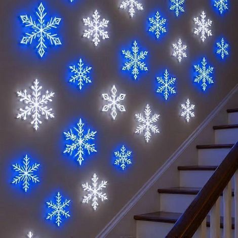 Lot de 12 guirlandes lumineuses LED flocons de neige, avec télécommande et couleurs changeantes, décorations murales de Noël autocollantes pour chambre et escalier. (1/4)