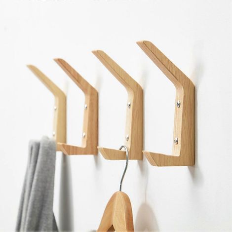 Crochets muraux en bois kaki avec 4 cintres pour ranger les vêtements. (1/4)