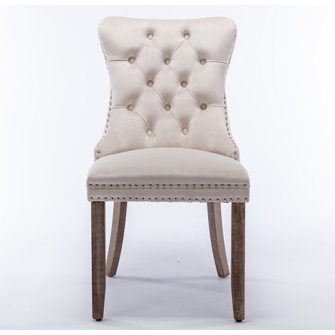 Collection Nikki : Lot de 2 chaises à manger haut de gamme,bois massif touffé,velours contemporain,pieds bois,finitions cloutées,beige.