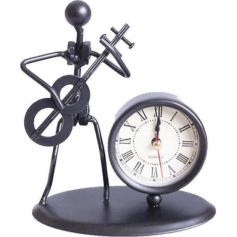 1 horloge artisanale en métal (1/3)