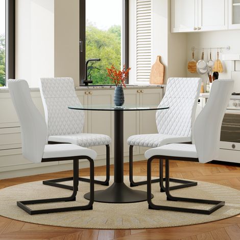 Ensemble table ronde en verre 85 cm + 4 chaises blanches en PU à coutures losanges. Design élégant adapté aux petites salles à manger et espaces bar. (1/5)