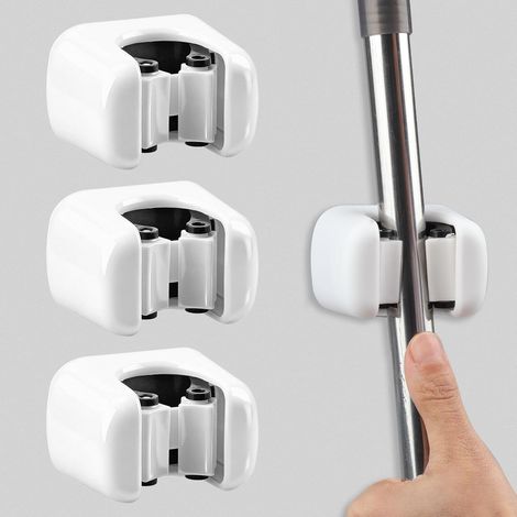 Set di 3 supporti autoadesivi da parete per scope e mop, ideali per bagno, ufficio, cucina, garage e giardino. (1/5)