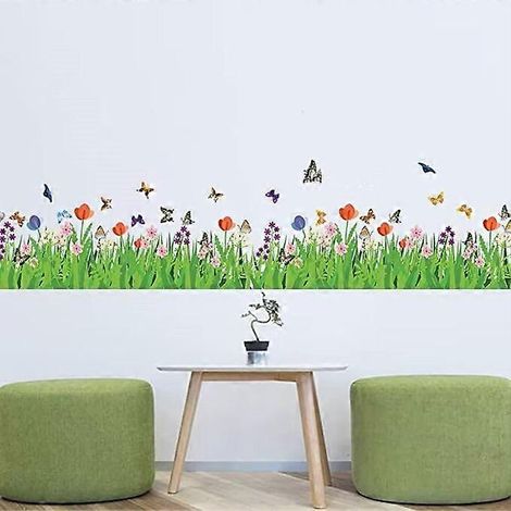 Stickers muraux décoratifs motif fleurs et herbe verte avec papillons, pour la décoration d'angle d'une chambre d'enfant ou d'un salon. (1/5)