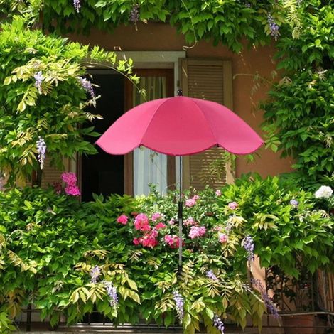Installez des parasols pour protéger les plantes d'extérieur du soleil brûlant et pour ombrager les fleurs du jardin. (1/5)
