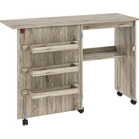 Table à coudre pliante avec abattant, bacs de rangement, étagère ouverte et roulettes, finition bois grisé. (1/5)