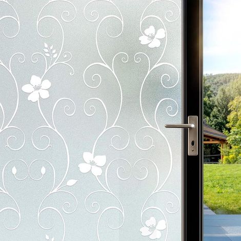 Blickdichte, selbstklebende Fensterfolie mit weißem Blumenmuster, die Sichtschutz und Dekoration vereint. (1/5)