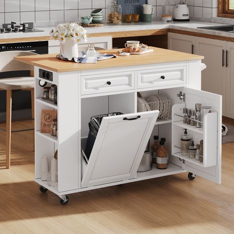Îlot de cuisine blanc à roulettes avec compartiment poubelle et porte-serviettes. Multiprises intégrées pour cuisine et salle à manger