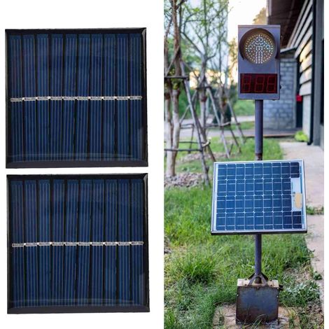 2 panneaux solaires de 0,7 W chacun, en résine époxy. (1/5)