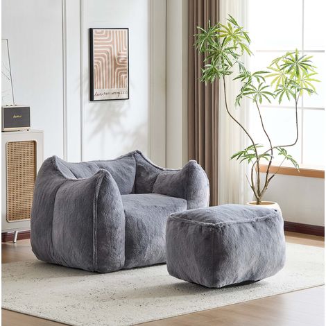 Poltrona lounge con pouf 126x100,5x75 cm in pelliccia sintetica grigia – MEUBLIV (1/5)