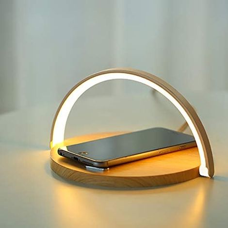 Lámpara de noche LED regulable con carga inalámbrica Qi, alimentación por USB y control táctil para dormitorio, estudio y oficina.