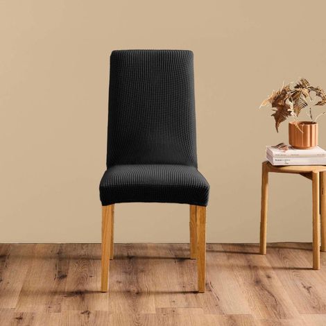 Housse de chaise extensible en polyester gaufré coloris noir (1/4)