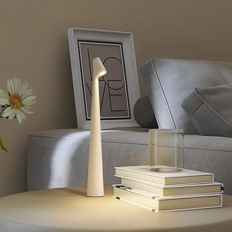 Piccola lampada da tavolo senza fili e ricaricabile, di colore bianco, portatile e delicata per gli occhi, ideale per interni, studio e camera da letto. (1/4)